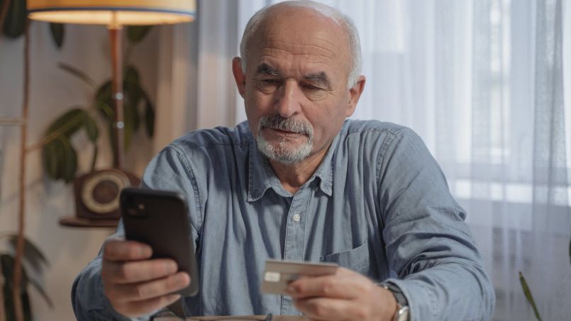 Retirees using credit cards to earn cashback rewards on everyday purchases